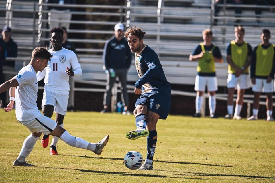 Matthias Lavenant tries to avoid a takeaway attempt by a Virginia defender during the FIU’s men’s soccer team’s 2-1 overtime loss to Virginia in the second round of the NCAA tournament this past weekend.