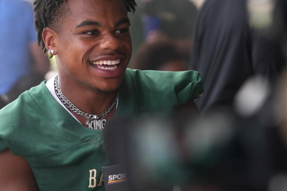 Basha's Cole Martin speaks to the press during Chandler Unified School Districtâ€™s Media Day with players from Arizona College Prep., Chandler, Hamilton, Basha, Casteel and Perry High Schools at Valle Luna Mexican Restaurant on Wednesday, Aug. 3, 2022.