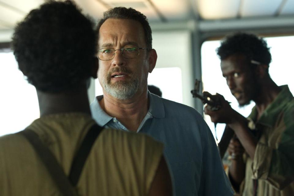 This film image released by Sony - Columbia Pictures shows Tom Hanks, center, in "Captain Phillips." (AP Photo/Sony - Columbia Pictures)