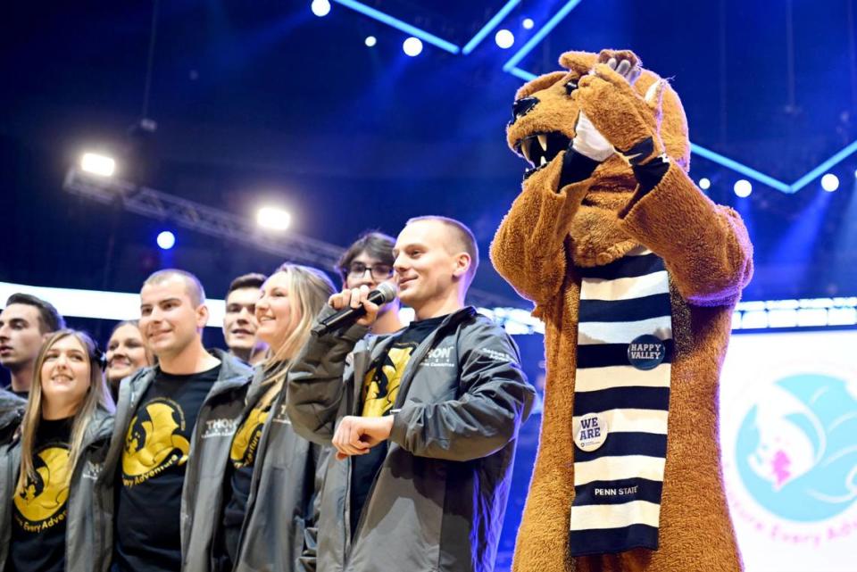 The executive committee for the 2024 Penn State IFC/Panhellenic Dance Marathon and the Nittany Lion cheer on dancers as they prepare to stand for 46 hours on Friday, Feb. 16, 2024 at the Bryce Jordan Center.