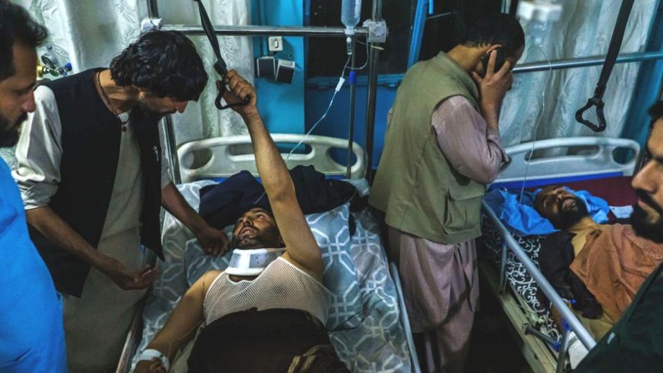 Family members visit wounded patients who have been admitted into Wazir Akbar Khan Hospital. in Kabul, Afghanistan