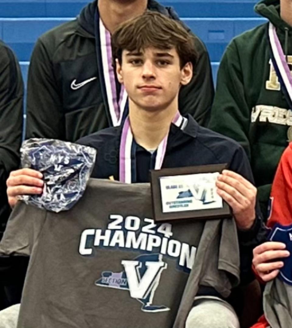 Victor wrestler Drew Aparo after the Section V Class A1 Championships.