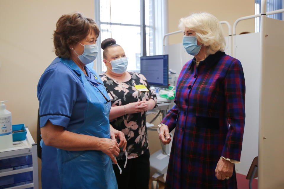 BIRMINGHAM, ENGLAND - FEBRUARY 17: Camilla, Duchess of Cornwall visits The Queen Elizabeth Hospital on February 17, 2021 in Birmingham, England. (Photo by Molly Darlington - WPA Pool/Getty Images)