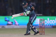 Pakistan's Mohammad Rizwan plays a shot during the first T20 cricket match between Pakistan and England, in Karachi, Pakistan, Tuesday, Sept. 20, 2022. (AP Photo/Anjum Naveed)