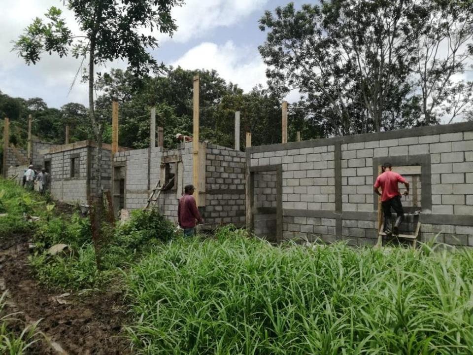 Houses under construction in the La Lima community, part of the San Ramon network. Safe, secure housing is one of Rainbow Network’s four program areas.