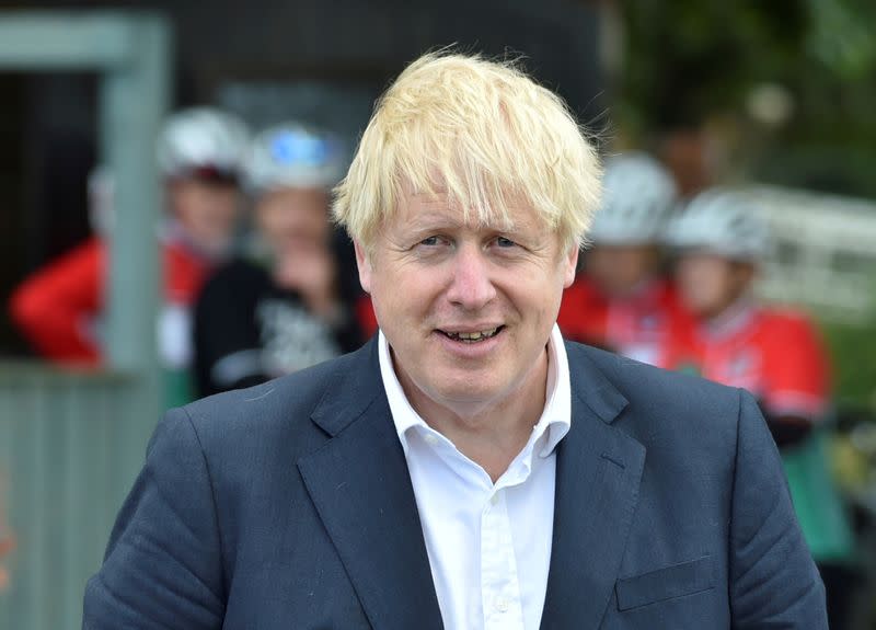 FILE PHOTO: British Prime Minister Boris Johnson speaks to local people at a heritage centre in Beeston near Nottingham, England