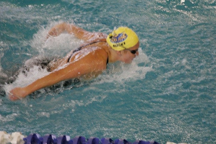 Caitlin Macky, pictured here swimming for San Jose State University, said athletic trainer Scott Shaw reached his hands in her bra and underwear during treatments.