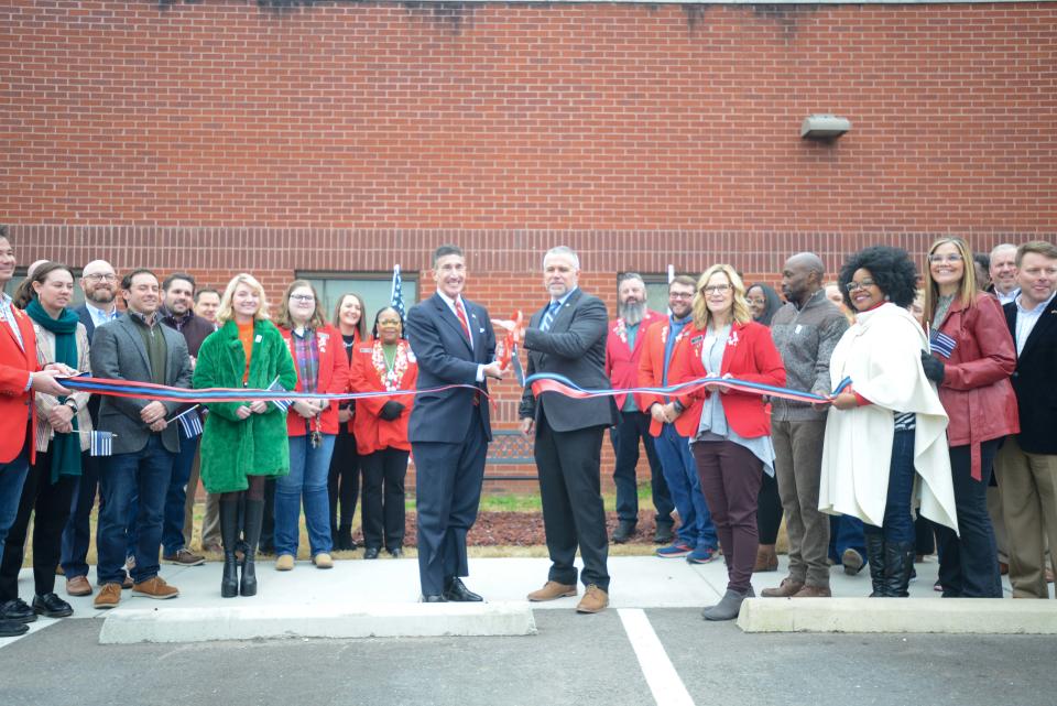 Congressman David Kustoff and Madison County Sheriff Julian Wiser cut the ribbon to celebrate the new 'Reflection Garden' at J. Alexander Leech Criminal Justice Complex in Jackson, Tenn., on Wednesday, Jan. 3, 2024.
