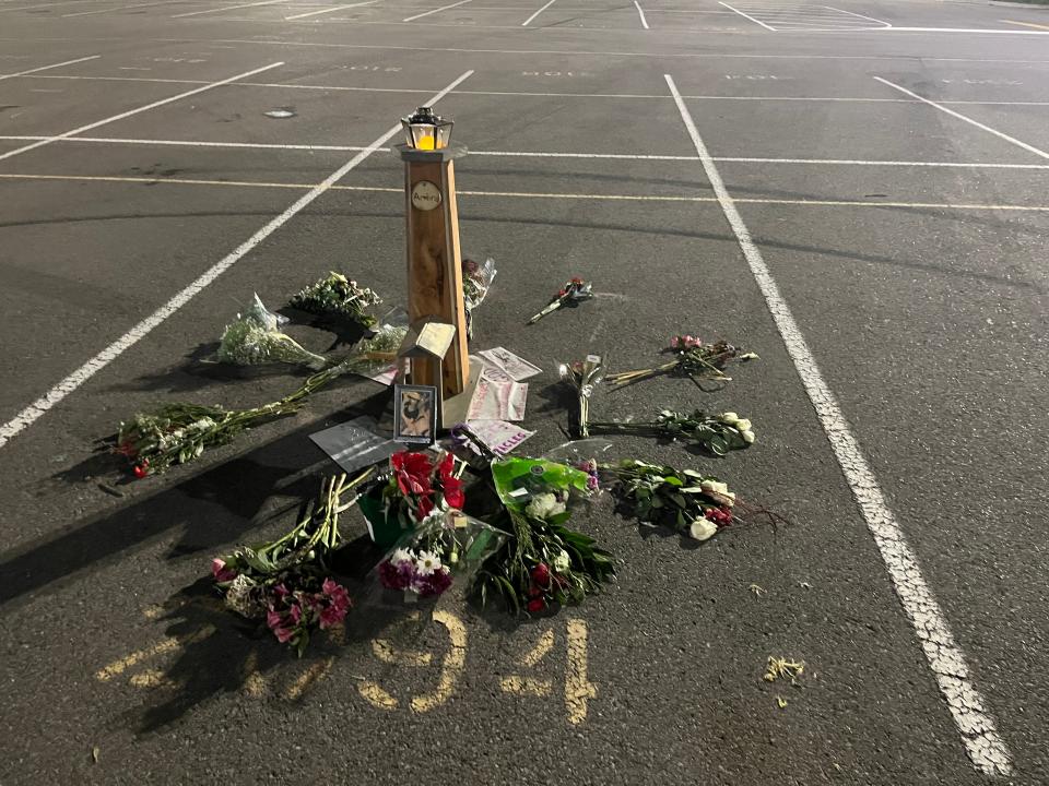 Flowers were left at Ambria McGregor's parking spot at Green Hill High School in Mt. Juliet after the student died in a December 2022 crash.