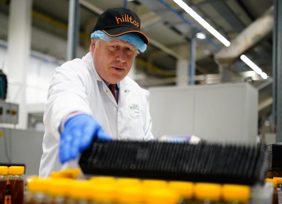 Prime Minister Boris Johnson visited Hilltop Honey in Powys, Wales, on Friday (Ben Birchall/PA) (PA Wire)