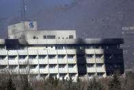 <p>Afghan security personnel are seen at the roof of Intercontinental Hotel after an attack in Kabul, Afghanistan, Sunday, Jan. 21, 2018. Gunmen stormed the hotel and sett off a 12-hour gun battle with security forces that continued into Sunday morning, as frantic guests tried to escape from fourth and fifth-floor windows. (Photo: Rahmat Gul/AP) </p>