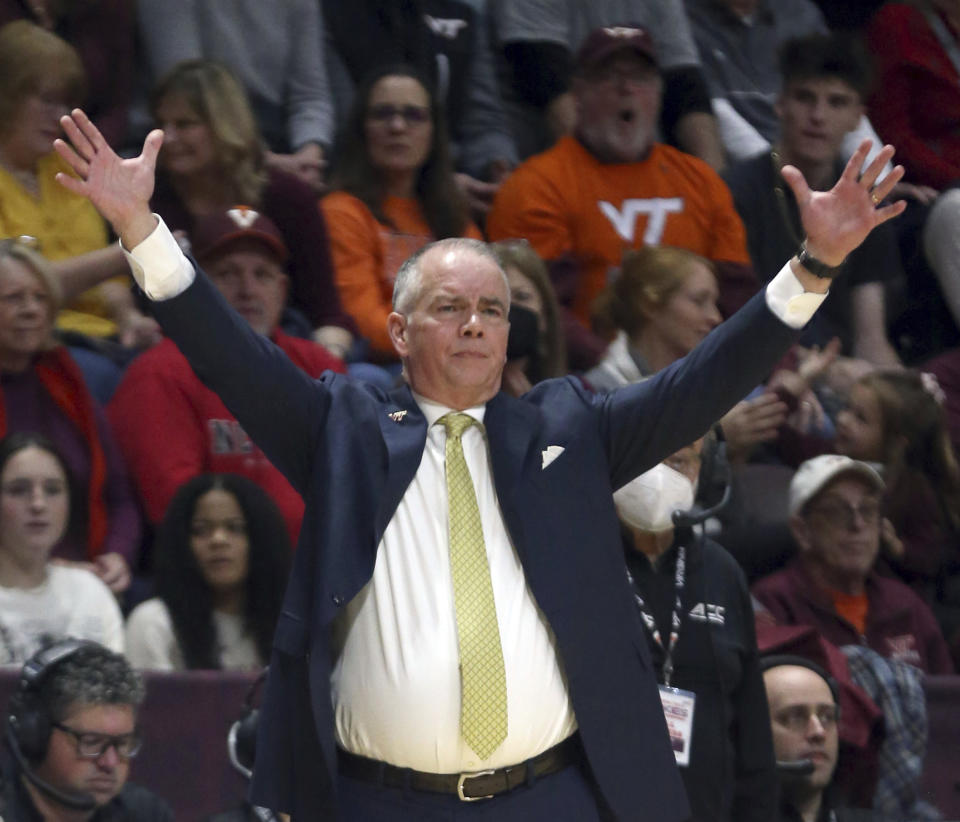 Virginia Tech coach Mike Young gestures during the first half of the team's NCAA college basketball game against North Carolina State on Saturday, Jan. 7, 2023, in Blacksburg, Va. (Matt Gentry/The Roanoke Times via AP)