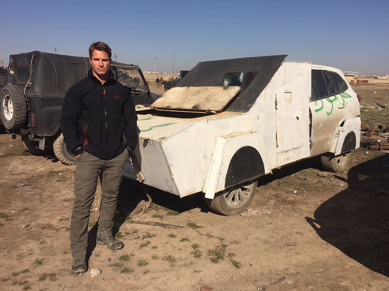 Denham Hitchcock with a captured vehicle car bomb in eastern Mosul.