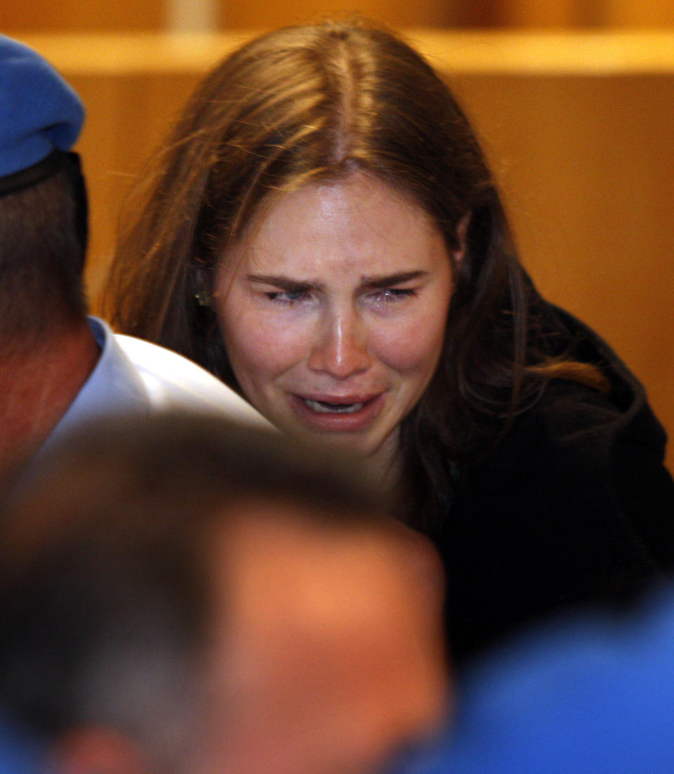 The appeals court <a href="http://www.huffingtonpost.com/huff-wires/20130326/eu-italy-knox-chronology/" target="_blank">overturns the murder convictions</a> of Knox and Sollecito and orders their immediate release.  <em>Amanda Knox breaks down in tears after hearing the verdict that overturns her conviction and acquits her of murdering her British roommate Meredith Kercher, at the Perugia court on October 3, 2011 in Perugia, Italy. (Photo by Pier Paolo Cito - Pool/Getty Images)</em>