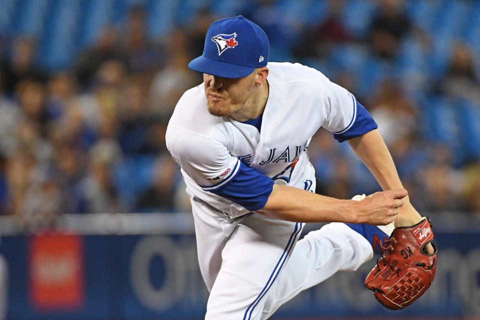 TORONTO, ON - AUGUST 27: Toronto Blue Jays Pitcher Ken Giles (51) pitches in the ninth inning during the game between the Atlanta Braves and Toronto Blue Jays on August 27, 2019 at Rogers Centre in Toronto, ON. (Photo by Gerry Angus/Icon Sportswire via Getty Images)