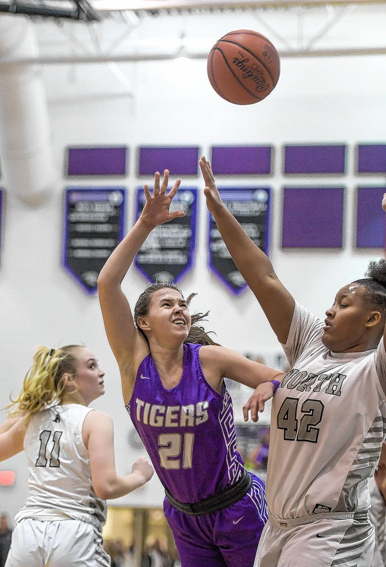 Central senior point guard Nicole Stephens shoots over North's Jada Moultair during the visiting Tigers' 44-29 win Jan. 17. Stephens is a Columbia recruit.