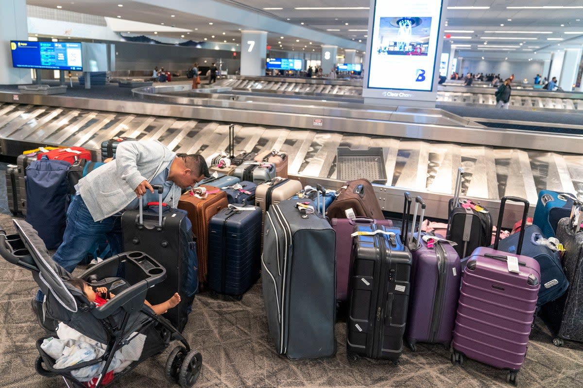 Baggage sits unclaimed at LaGuardia Airport amid delays on Tuesday (Copyright 2023 The Associated Press. All rights reserved)