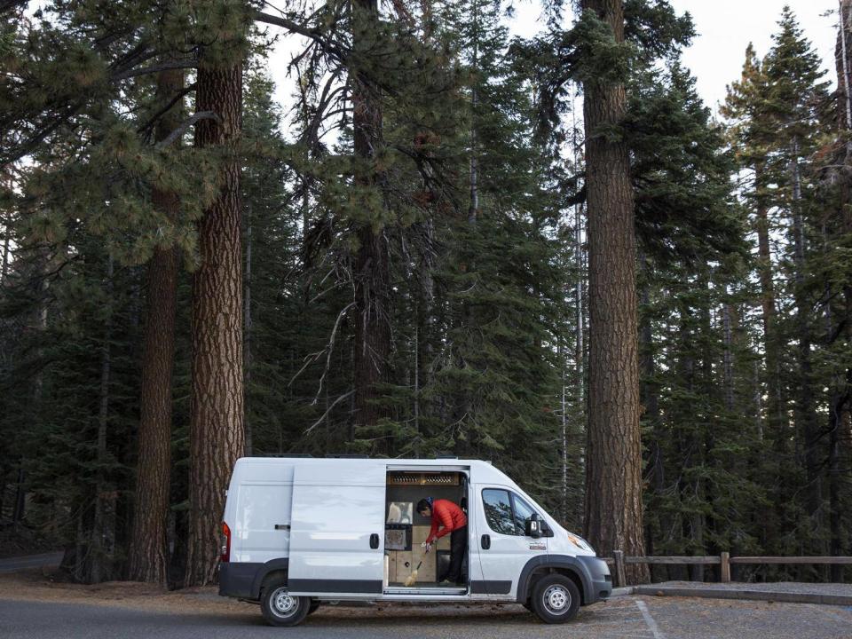 Honnold cleaning his van in Yosemite national park (National Geographic/Jimmy Chin)
