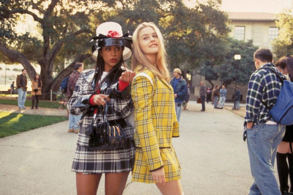 Dionne and Cher in matching mini skirt suits in “Clueless,” 1995. - Credit: Everett Collection