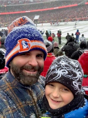 Nick Waage and son Miles at a Kanas City Chiefs game at Arrowhead Stadium in Kansas City, Missouri.