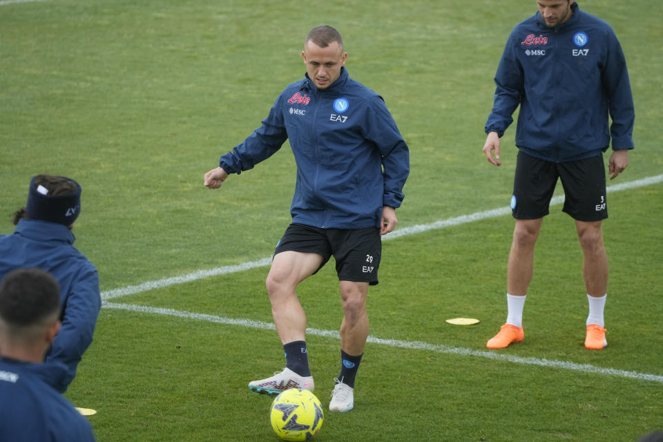 Napoli's Stanislav Lobotka warms up during a training session at the club headquarters in Castel Volturno, near Naples, Wednesday, April 5, 2023. Unlike other major cities in Italy, Naples has only one major soccer team and the fan support for Napoli is felt on every street and alleyway. Lobotka, who developed with Ajax’s junior squad and then played for Danish club Nordsjaelland and Spanish side Celta Vigo before transferring to Italy, had never experienced anything like Napoli. (AP Photo/Gregorio Borgia)