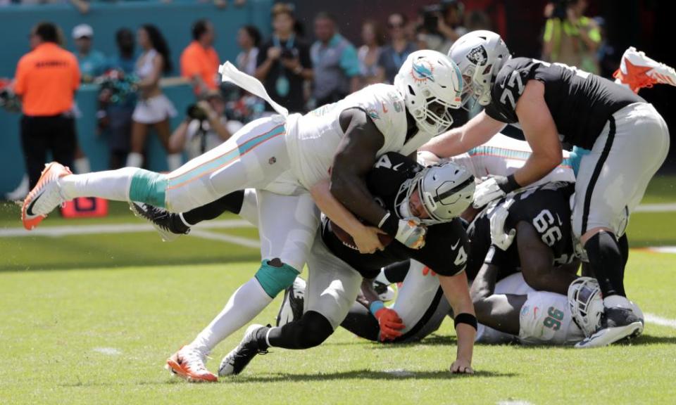 William Hayes’s season ended as he attempted to avoid roughing the passer as he tackled Derek Carr