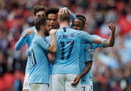 Soccer Football - FA Cup Final - Manchester City v Watford - Wembley Stadium, London, Britain - May 18, 2019 Manchester City's Raheem Sterling celebrates scoring their sixth goal to complete his hat-trick REUTERS/David Klein