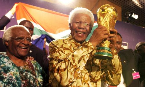 Desmond Tutu and Nelson Mandela with the trophy