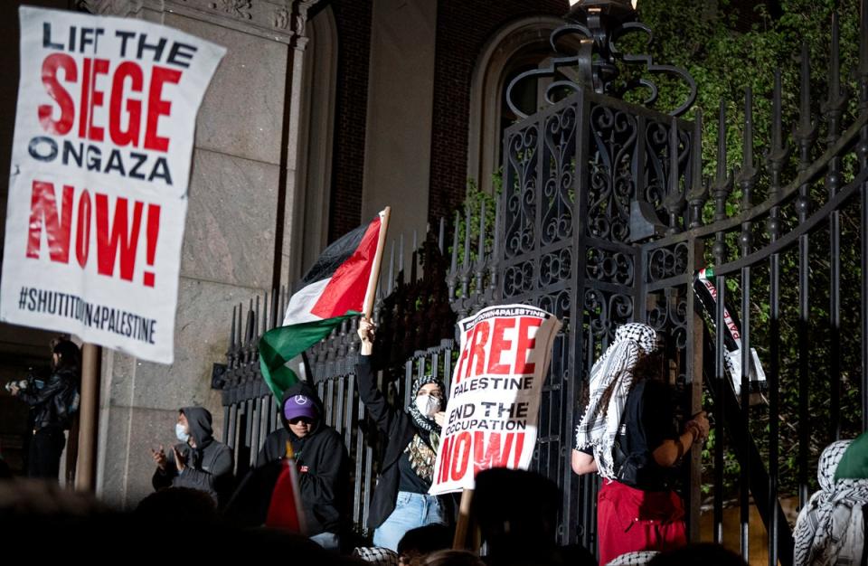 Pro-Palestianian protesters gather near a main gate at Columbia University in New York, Tuesday, April 30, 2024 (Copyright The Associated Press 2024)