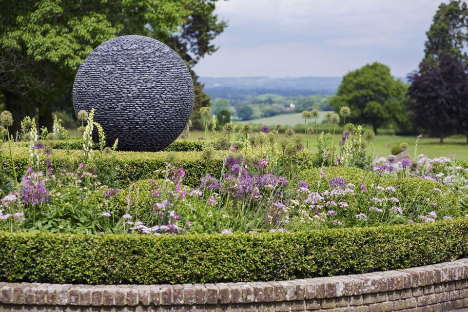 italianate estate in goudhurst, england design by jo thompson landscape garden design a sculpture by david harber overlooks the weald