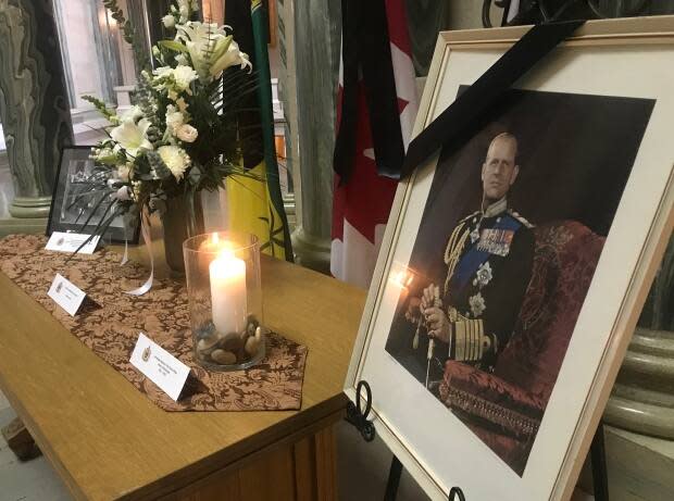 A display honouring the late Prince Philip is featured at the Saskatchewan Legislature in Regina. (Adam Hunter/CBC - image credit)