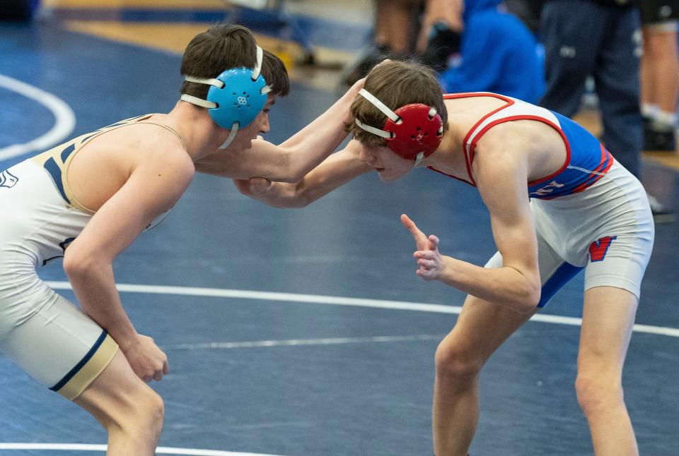 Council Rock South's Connor Lenahan (left), shown here wrestling Neshaminy's Sean Pokalsky at last week's PIAA District One East Class 3A tournament, is one of the area's top performers.