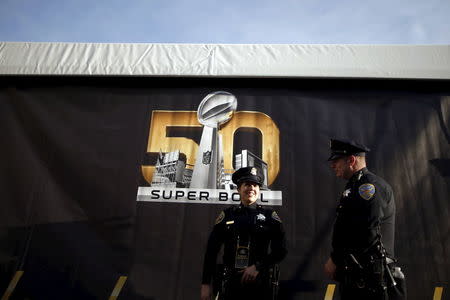 Police patrol downtown San Francisco before NFL Super Bowl 50 in San Francisco, California, United States, February 4, 2016. REUTERS/Lucy Nicholson