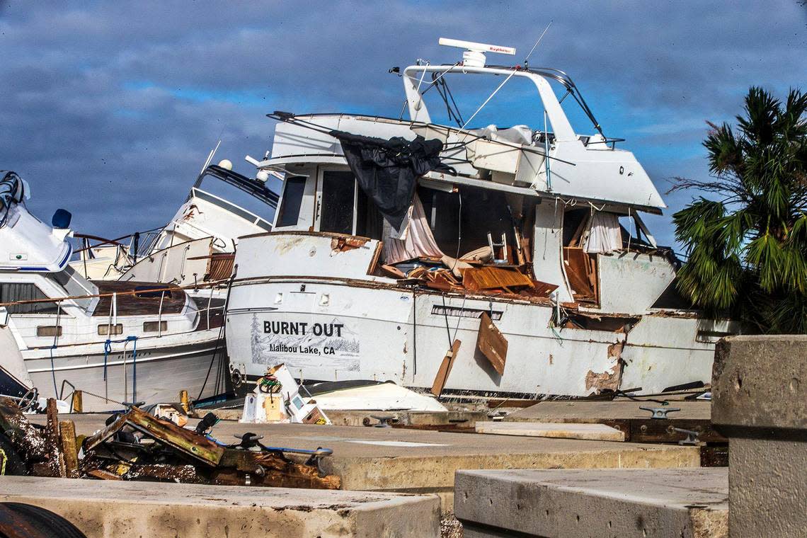 Large displaced boats sit on land in the Legacy Harbour Marina in Fort Myers Thursday, Sept. 29, 2022, the day after Hurricane Ian landed in the area as a powerful Category 4 storm.