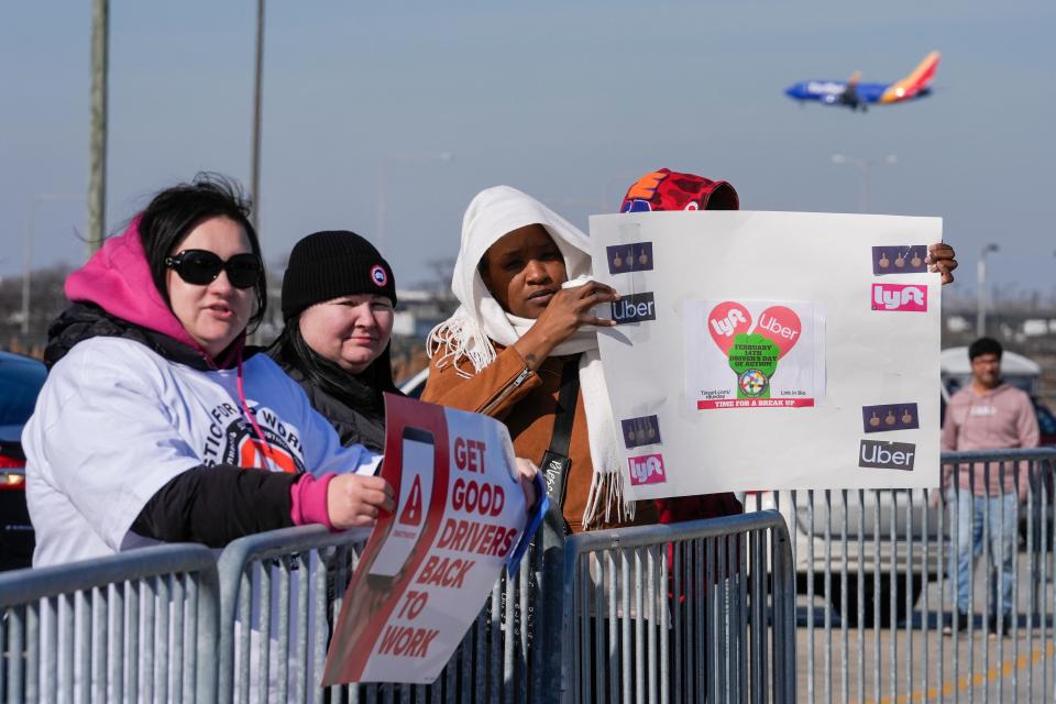 People protest ride-hailing companies like Uber, Lyft and others in the Transportation Network Provider parking lot at O'Hare International Airport, Wednesday, Feb. 14, 2024, in Chicago.