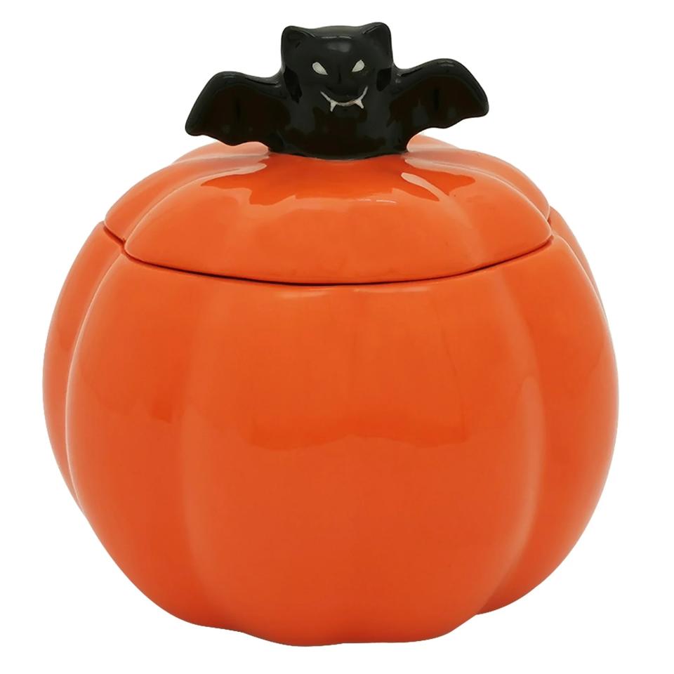 the orange pumpkin shaped jar