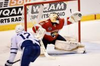 Jan 18, 2019; Sunrise, FL, USA; Florida Panthers goaltender Roberto Luongo (1) makes a glove save from a shot from Toronto Maple Leafs center Patrick Marleau (12) during the second period at BB&T Center. Mandatory Credit: Steve Mitchell-USA TODAY Sports