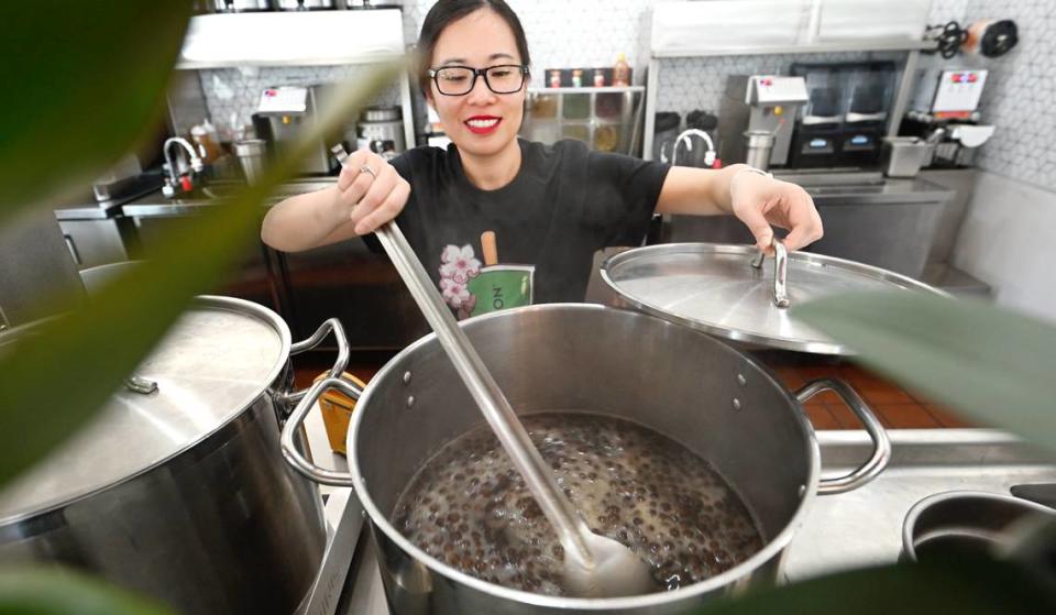 Owner Quynh Nguyen stirs simmering boba pearls at Teaspoon boba tea cafe on Pelandale Avenue in Modesto, Calif., Tuesday, April 9, 2024.