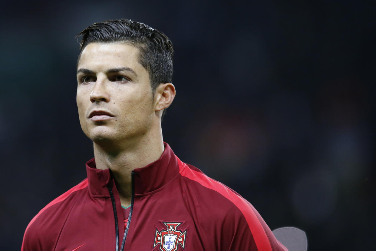 Cristiano Ronaldo of Portugal is seen before his team's International Friendly soccer match against Argentina at Old Trafford Stadium, Manchester, England, Tuesday Nov. 18, 2014. (AP Photo/Jon Super)