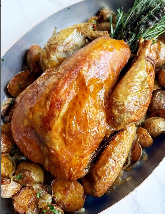 Roast chicken is Cafe Boulud's bow to comfort food. It's brined before it's cooked, and the restaurant uses high-quality butter for the skin-rub.