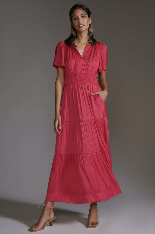 model with black hair wearing hot pink The Somerset Maxi Dress (Photo via Anthropologie)