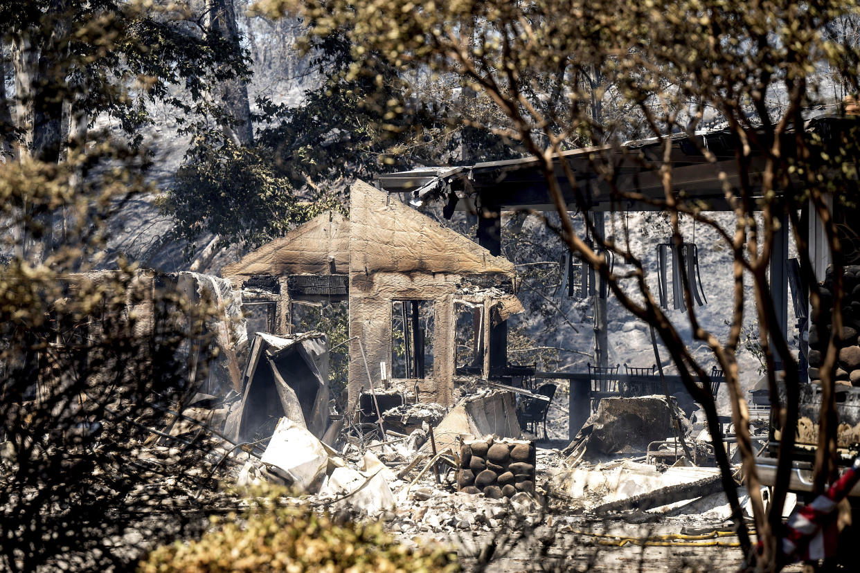 Charred walls stand at a residence destroyed by the Park Fire on Sycamore Valley Road near Chico, Calif., on July 25, 2024. / Credit: AP Photo/Noah Berger