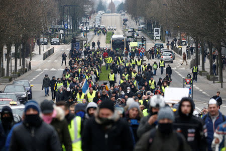 Protesters wearing yellow vests take part in a demonstration of the "yellow vests" movement in Nantes, France, January 5, 2019. REUTERS/Stephane Mahe