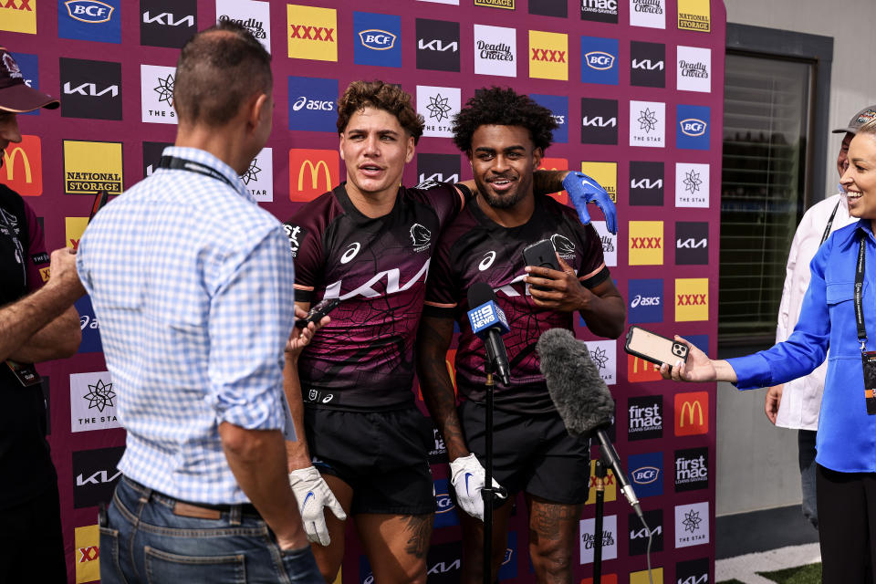 THOUSAND OAKS, CALIFORNIA - FEBRUARY 24: Reece Walsh and Ezra Mam share a moment during a press conference after a Brisbane Broncos NRL training session at California Lutheran University on February 24, 2024 in Thousand Oaks, California. (Photo by Michael Owens/Getty Images)