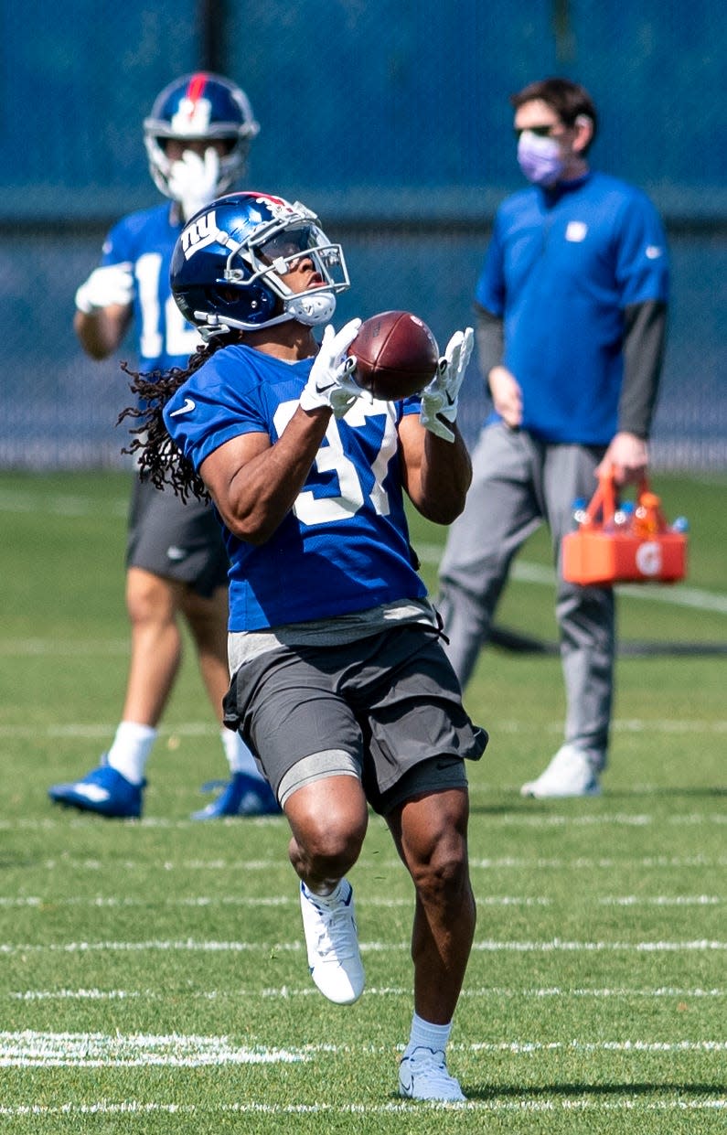 New York Giants Gary Brightwell #37 catches a pass during rookie minicamp at Quest Diagnostics Training Center in East Rutherford on May 14, 2021.