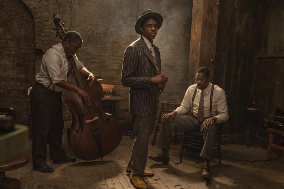 This image released by Netflix shows Michael Potts, from left, Chadwick Boseman and Colman Domingo in “Ma Rainey’s Black Bottom.” (David Lee/Netflix via AP)
