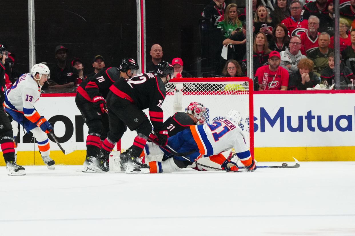 New York Islanders center Kyle Palmieri (21) misses on his scoring attempt against Carolina Hurricanes goaltender Frederik Andersen (31) during the third period of Game 1.