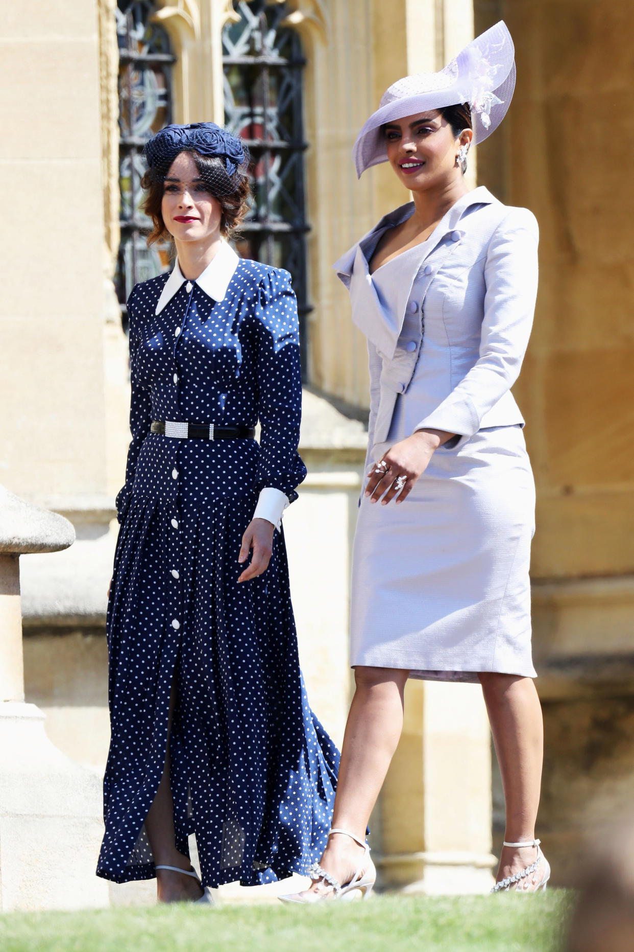  (L-R)Abigail Spencer and Priyanka Chopra arrive at the wedding of Prince Harry to Ms Meghan Markle at St George's Chapel, Windsor Castle on May 19, 2018 in Windsor, England.  Chris Jackson/Pool via REUTERS