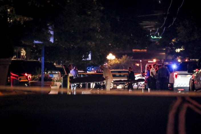Bodies are removed from at the scene of a mass shooting, Sunday, Aug. 4, 2019, in Dayton, Ohio. Several people in Ohio have been killed in the second mass shooting in the U.S. in less than 24 hours, and the suspected shooter is also deceased, police said. (Photo: John Minchillo/AP)