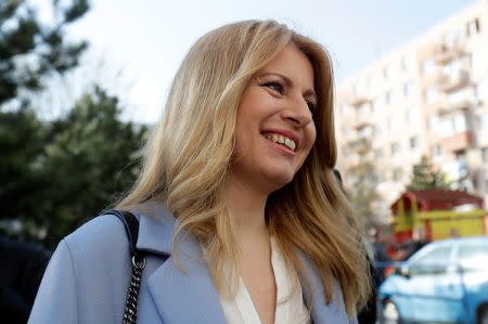 Slovakia's presidential candidate Zuzana Caputova reacts as she leaves after casting her vote during the country's presidential election run-off, at a polling station in Pezinok, Slovakia, March 30, 2019. REUTERS/David W Cerny